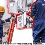 an image of two AEDC workers standing on ladders, installing meters